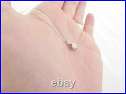 18ct gold diamond 1/2ct pendant on 9ct gold chain boxed