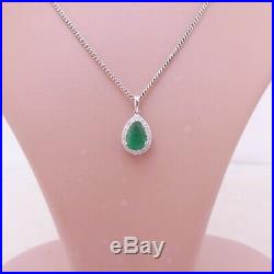 18ct gold emerald diamond pendant on 9ct gold chain