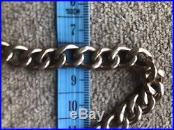9ct Gold, Curb Chain Bracelet With Heart Padlock, 35.2 Grammes. Hallmarked