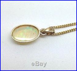 9ct gold Natural opal Oval pendant, new, actual one, gift boxed, 16 chain