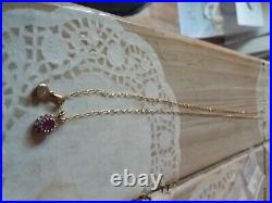 9ct gold chain with diamond pendant and a ruby and diamond pendant
