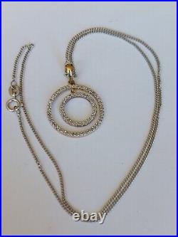 9ct gold diamond pendant + 9ct white gold curb chain