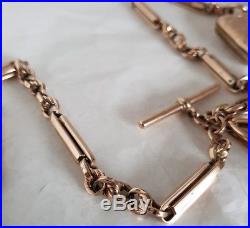 A Victorian 9ct gold double Albert watch chain, fob, T-bar & Vesta match case