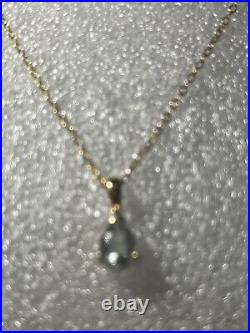 Teardrop 9ct gold and aquamarine pendant (1.69g) and chain hallmarked 9ct 44cm