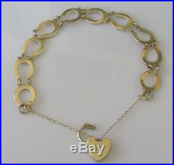 Vintage 9ct yellow gold multi horse shoe (9.9g) bracelet & safety chain